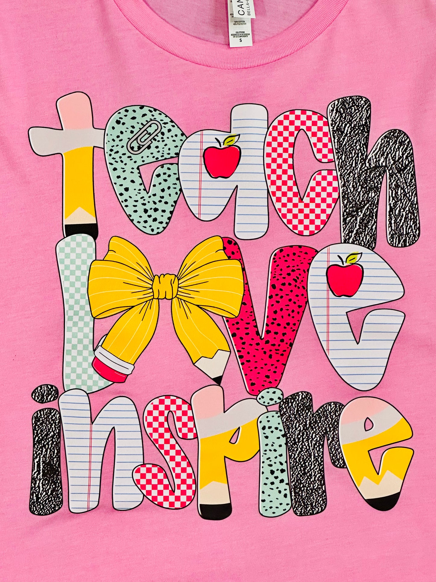 “Teach Love Inspire” Teacher Graphic Tee – Pink