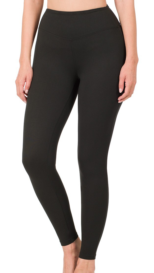 Black brushed microfiber leggings with wide waistband and full-length fit, shown on model.