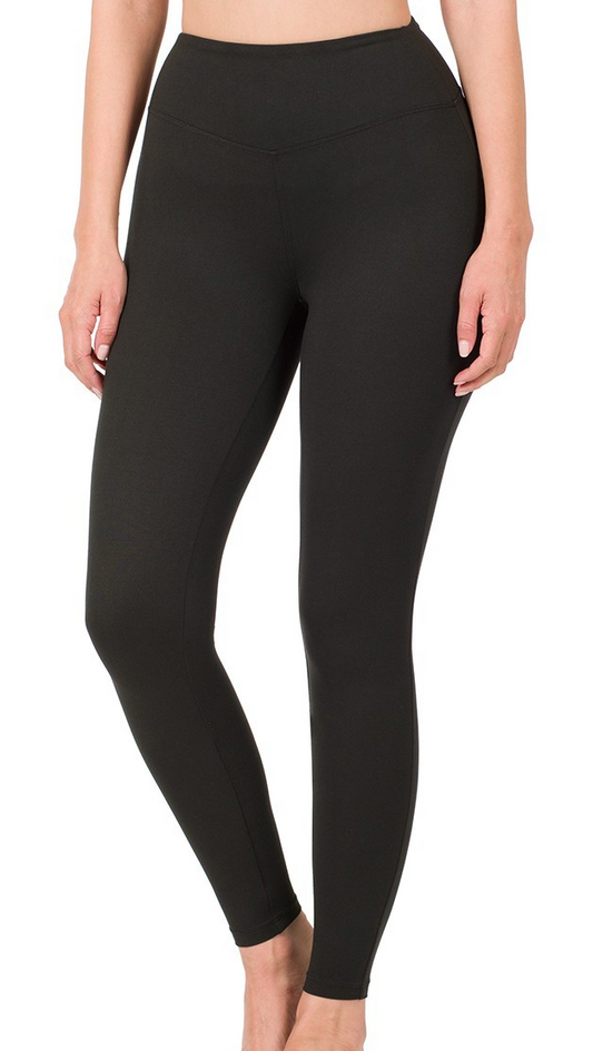 Black brushed microfiber leggings with wide waistband and full-length fit, shown on model.