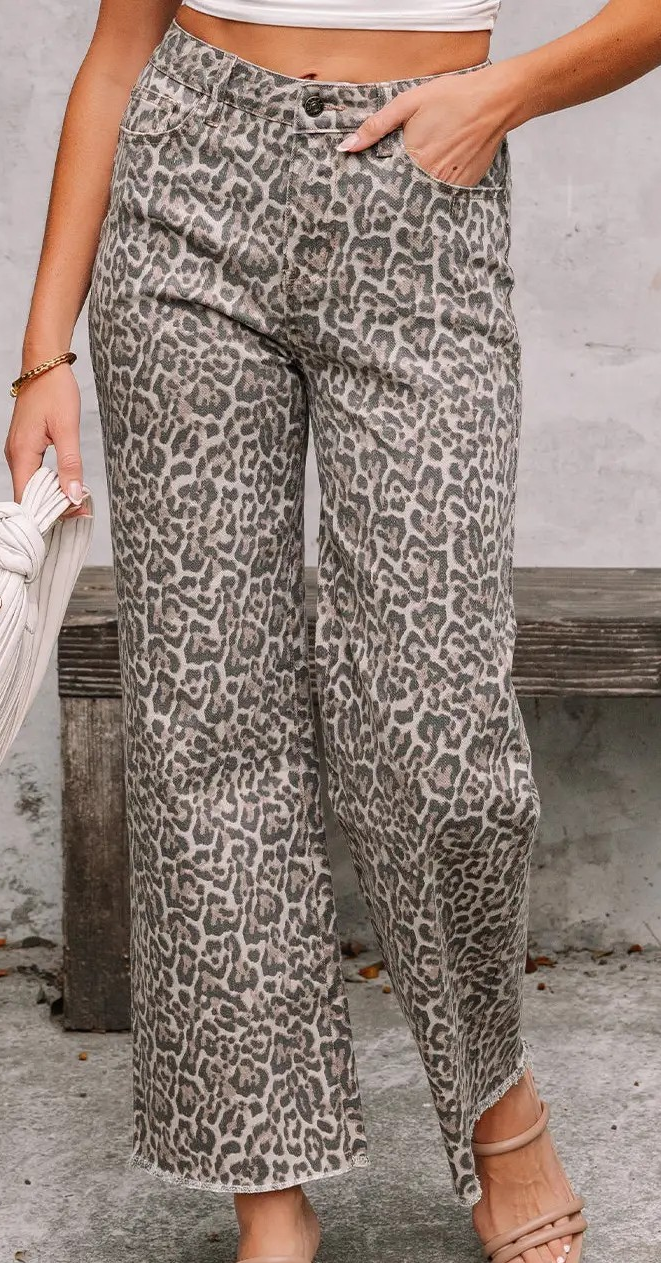 Leopard print high-waist straight leg jeans styled with neutral sandals, featuring a flattering fit and ankle-length inseam.