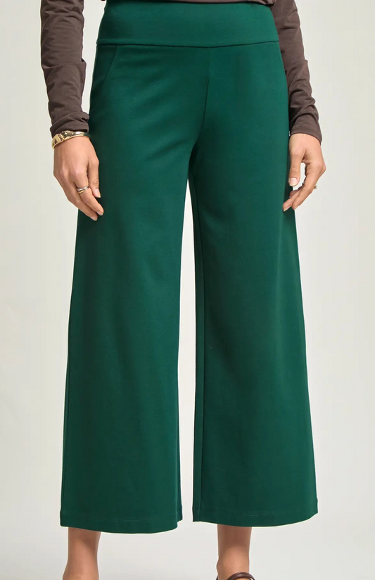 Hunter green cropped wide leg pants with pull-on waistband, shown on model