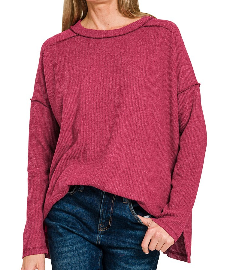 Brushed ribbed hacci long sleeve hi-low top in rose pink with relaxed fit and drop shoulders.