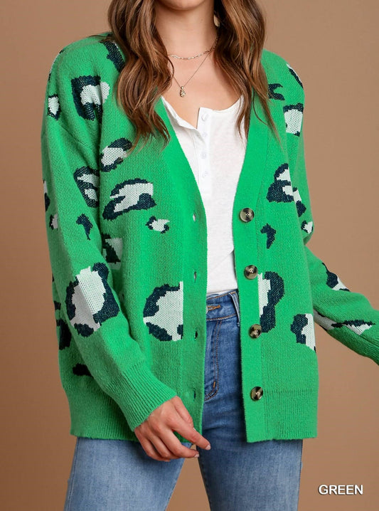 Green leopard print button-front cardigan with relaxed fit and soft knit texture.