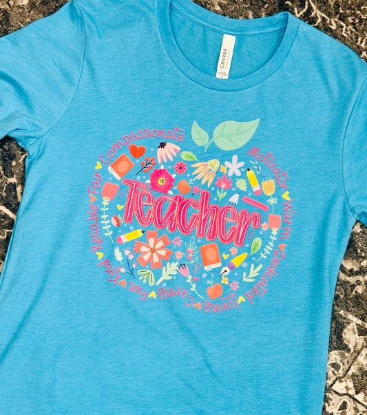 “Teacher” Floral Apple Graphic Tee – Teal