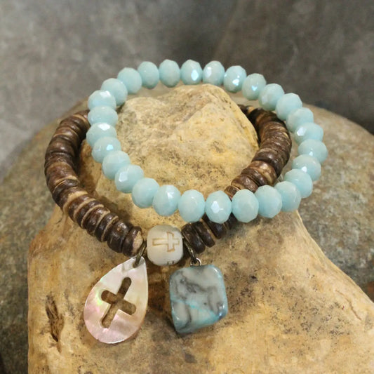 Faith and Earth bracelet set with aqua glass beads, wood discs, and cross charm.


