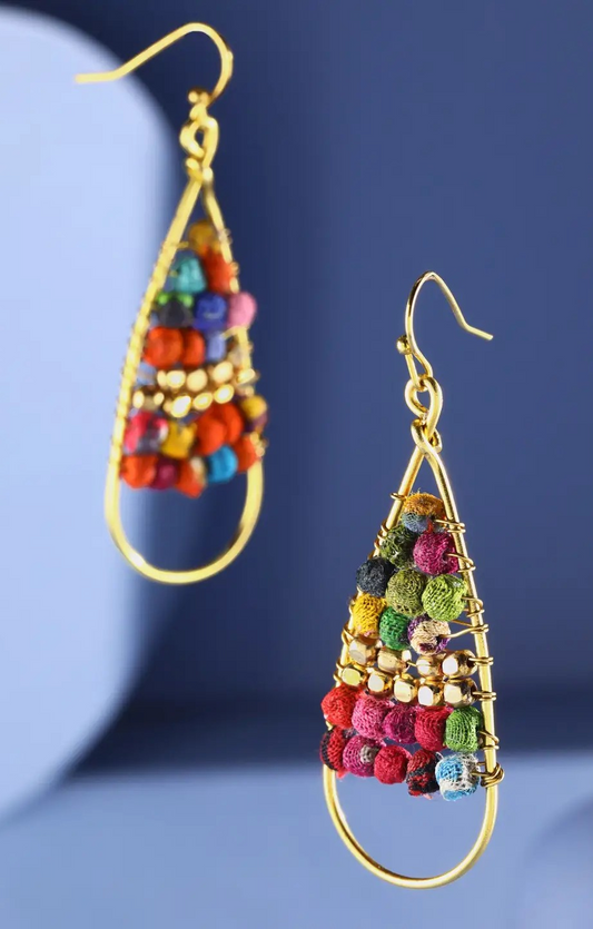 Gold teardrop earrings with colorful fabric bead accents and wire-wrapped design